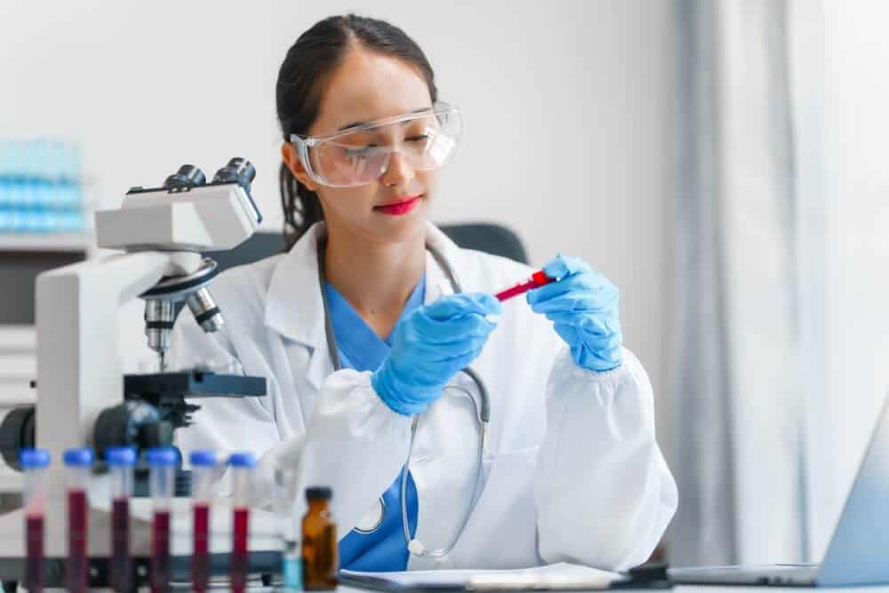 A female doctor performing a blood test