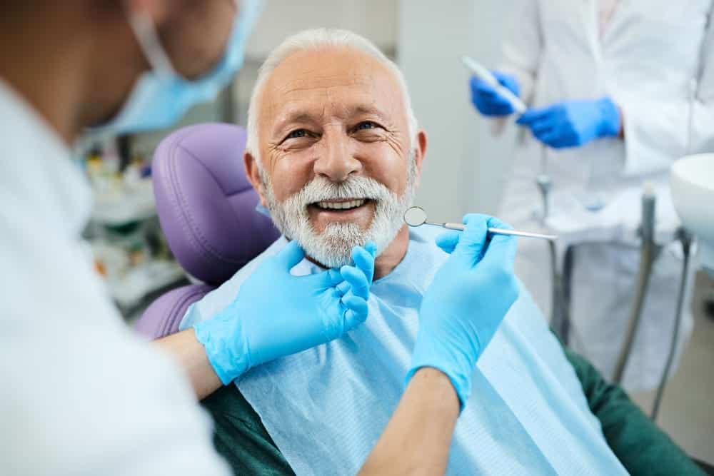 A senior man at a dental appointment