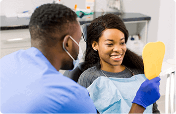 dentist showing teeth mirror