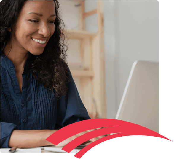 woman looks at computer