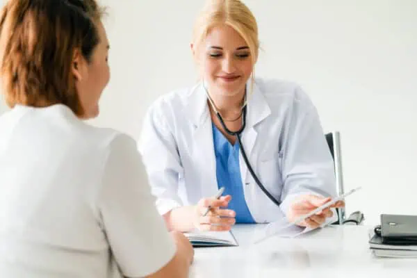 A doctor and patient discussing medical test results