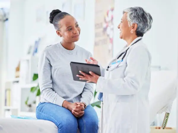A doctor and patient discussing medical test results